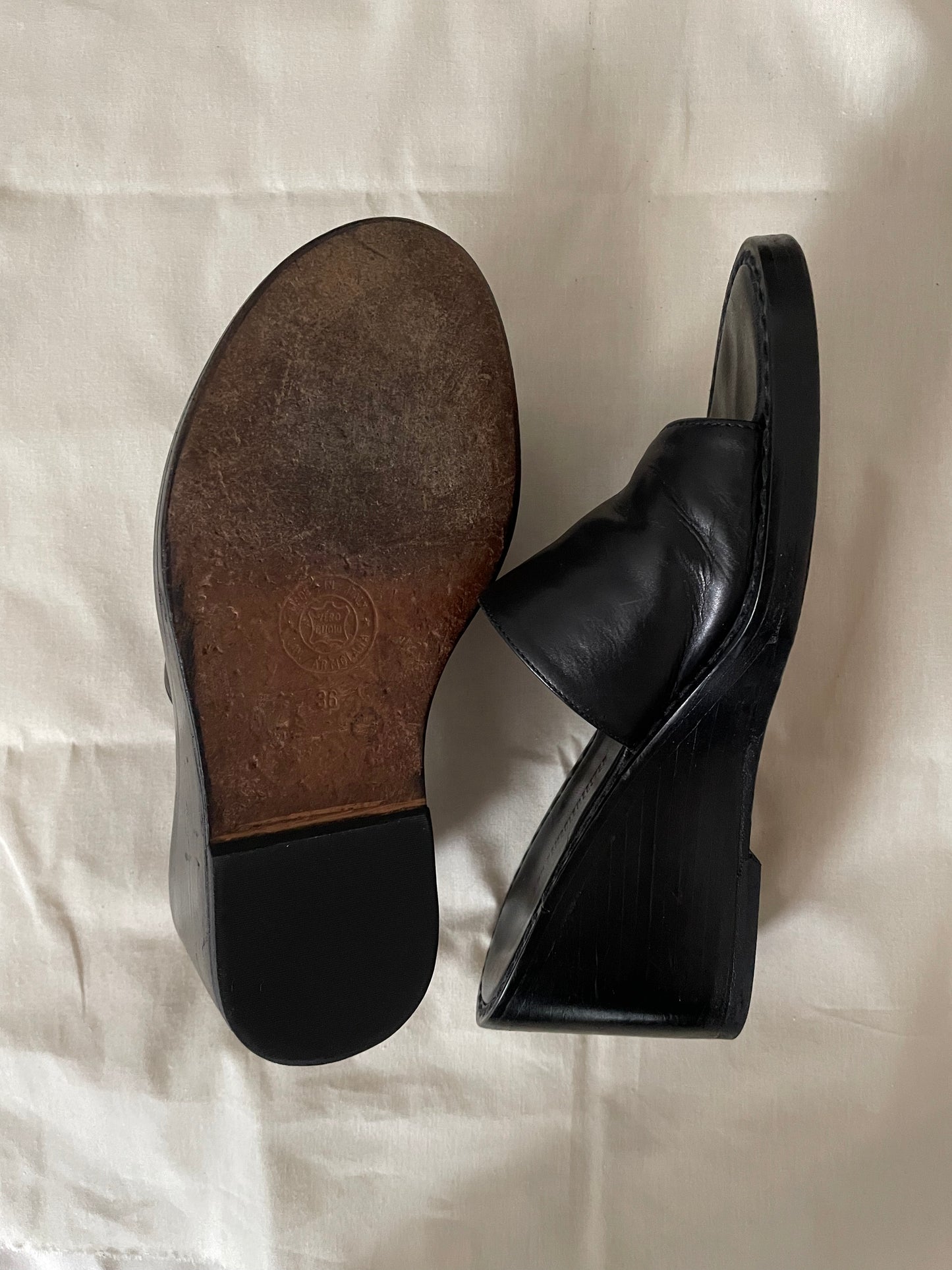 Soles of womens black Ann Demeulemeester wedge sandals