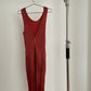 Back view of vintage IM Product red pleated apron dress