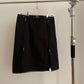 Front view of vintage womens Prada Sport black skirt with zippers