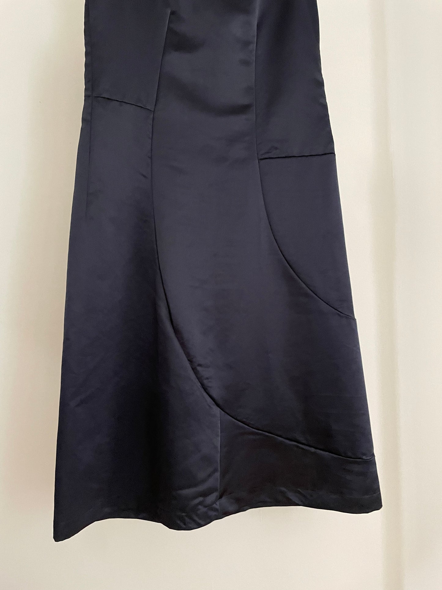 Detail view of vintage womens Comme des Garçons black midi dress with geometric panels