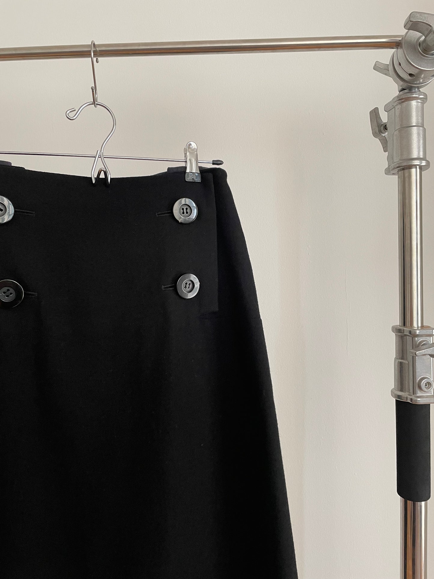 Detail view of vintage womens Yohji Yamamoto fall/winter 2005 collection black wool skirt