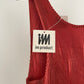 Detail view of vintage IM Product red pleated apron dress