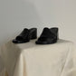Front view of womens black Ann Demeulemeester wedge sandals