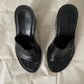 Top view of womens black Ann Demeulemeester wedge sandals
