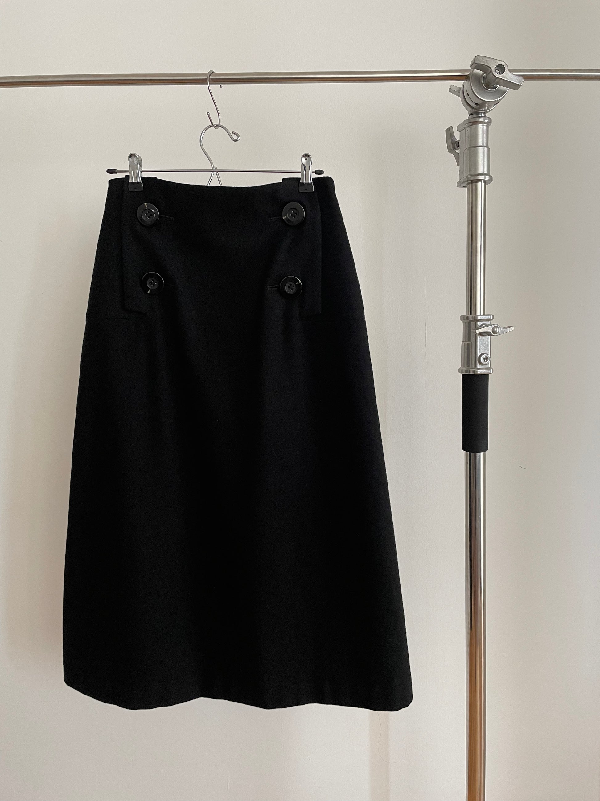 Back view of  vintage womens Yohji Yamamoto fall/winter 2005 collection black wool skirt