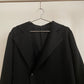 Detail view of vintage womens Yohji Yamamoto Noir black single button blazer